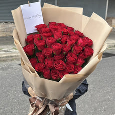 "Hugs and Kisses" Bouquet Of 50 Red Roses (Beige)